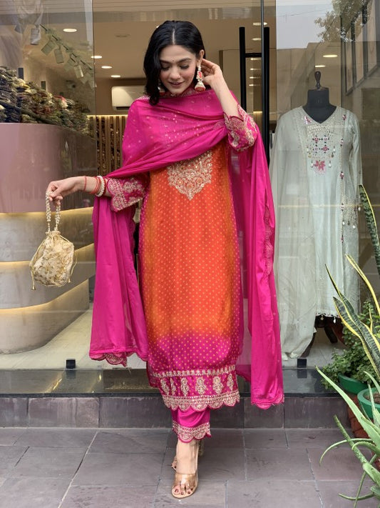 Silk Bandhani Festive Pink and Orange Salwar Set with Mirror Work and Golden Embroidery